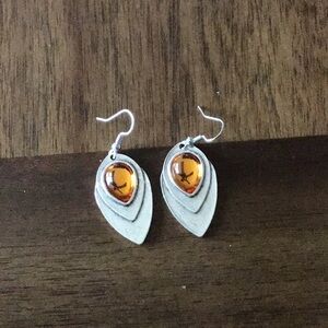 Silver in color dangle earrings new